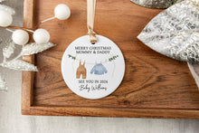Load image into Gallery viewer, Personalized Merry Christmas Mommy and Daddy ornament with baby's last name and due year on a wooden tray with decorative elements.