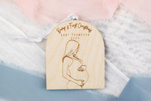 Load image into Gallery viewer, Wood Baby Bump's First Christmas Pregnancy Announcement Ornament, Personalized Gift for Expecting Parents