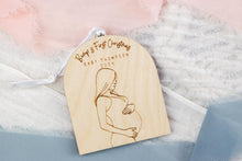 Load image into Gallery viewer, Wood Baby Bump's First Christmas Pregnancy Announcement Ornament, Personalized Gift for Expecting Parents