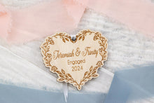 Load image into Gallery viewer, Personalized Engaged Christmas Ornament, Custom Engagement Gift for Couple, Wood Floral Vine Heart Ornament