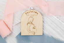 Load image into Gallery viewer, Wood Baby Bump's First Christmas Pregnancy Announcement Ornament, Personalized Gift for Expecting Parents