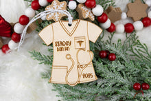 Load image into Gallery viewer, Personalized Wooden Scrub Top Ornament | Custom Nurse Ornament | Medical Professional Gift | Graduation Keepsake