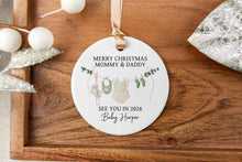 Load image into Gallery viewer, Personalized Merry Christmas Mommy & Daddy ornament on a wooden tray with decorative elements.
