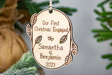 Load image into Gallery viewer, Wooden Personalized Our First Christmas Engaged Ornament - Leaf and Twig Shaped