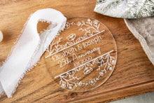 Load image into Gallery viewer, Clear Acrylic Personalized 25th anniversary ornament with engraved Names and wedding year on a wooden surface with decorative elements.
