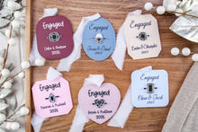 Load image into Gallery viewer, Engaged Box Shaped Christmas Ornaments Personalized on tray 
