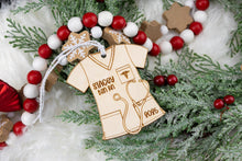Load image into Gallery viewer, Personalized Wooden Scrub Top Ornament | Custom Nurse Ornament | Medical Professional Gift | Graduation Keepsake
