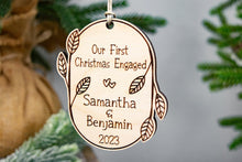 Load image into Gallery viewer, Wooden Personalized Our First Christmas Engaged Ornament - Leaf and Twig Shaped
